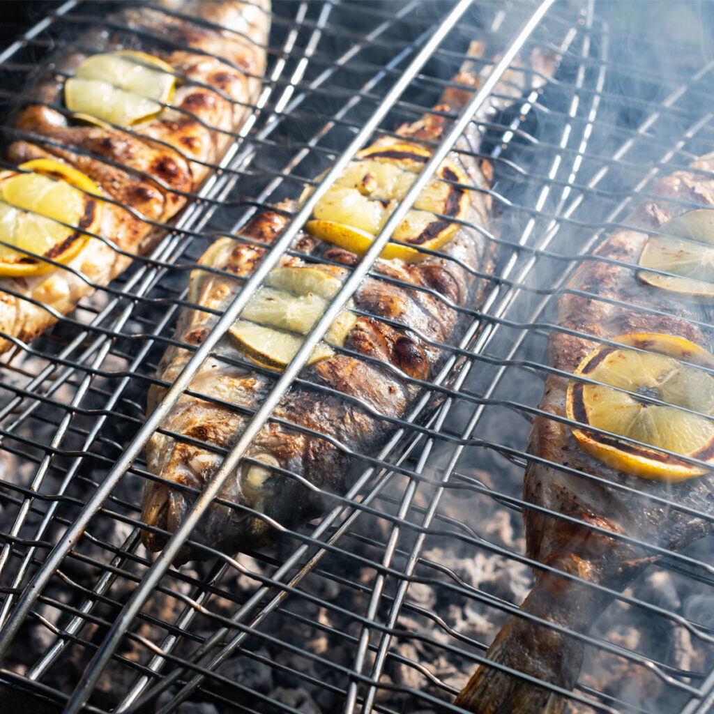 Grilling,Dorada,Fish,On,Grill.,Food,Photography Grilling dorada fish on grill. Food photography