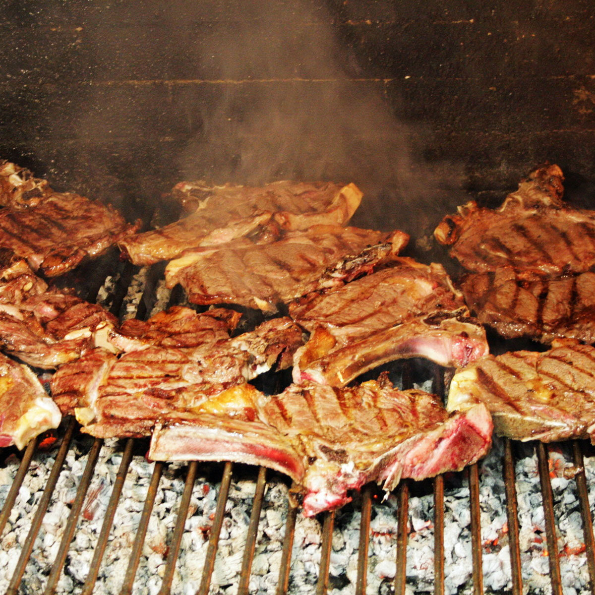 Cooked,Pork,Grilled,On,A,Fire,At,A,Restaurant cooked pork grilled on a fire at a restaurant